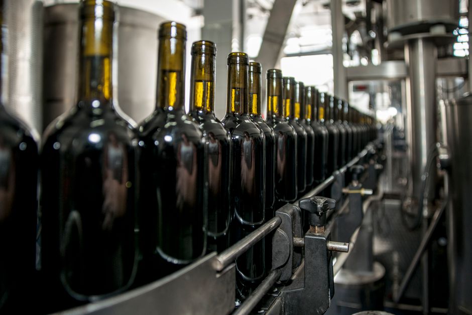 How Finite-Rank Bottlenecks Shape the Low-Rank Adaptation Landscape